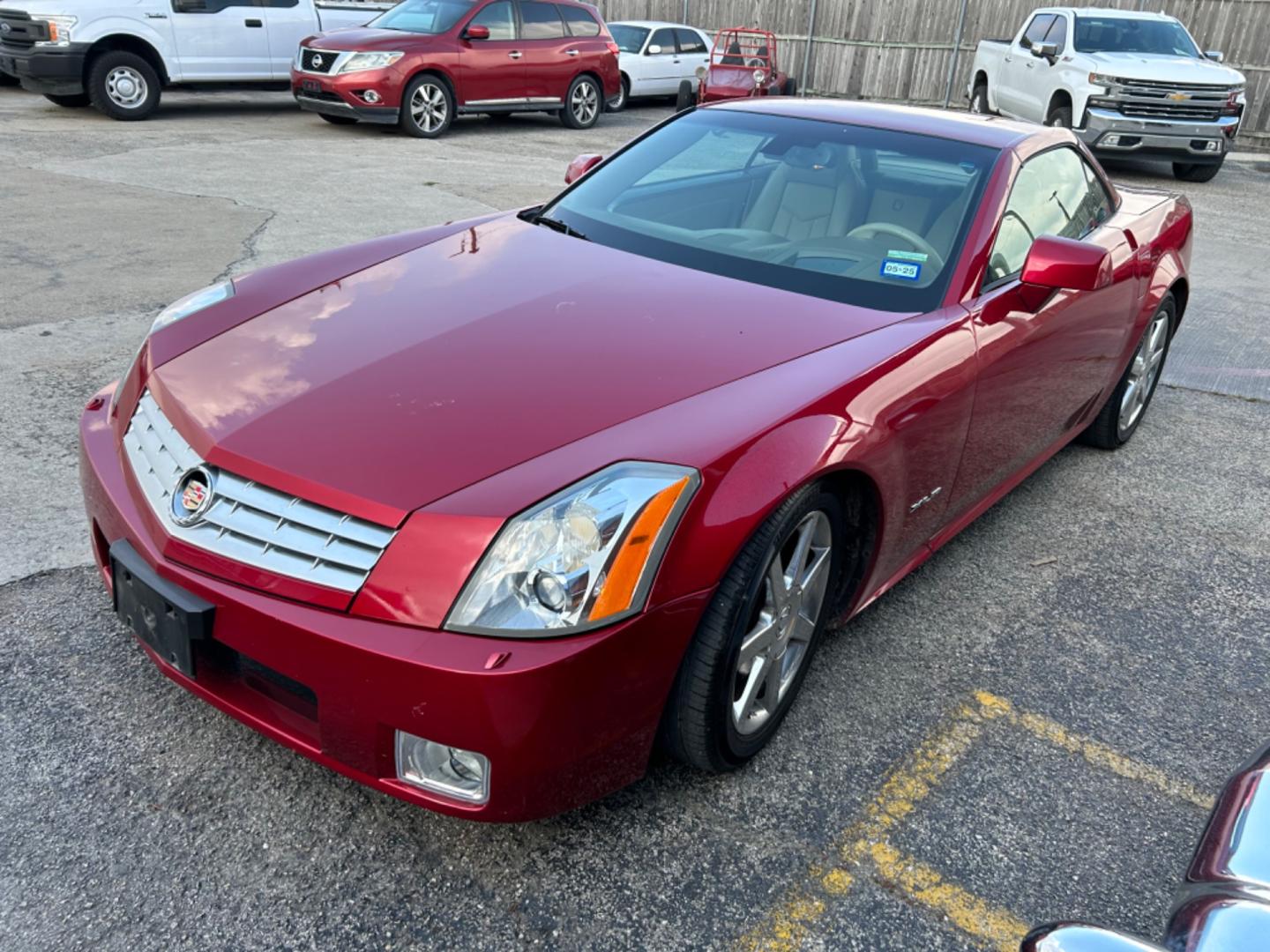 2005 Red Cadillac XLR Convertible (1G6YV34A355) with an 4.6L V8 DOHC 24V engine, 5-Speed Automatic Overdrive transmission, located at 1687 Business 35 S, New Braunfels, TX, 78130, (830) 625-7159, 29.655487, -98.051491 - Photo#1